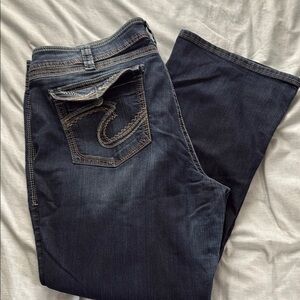 Silver Suki bootleg jeans. Size 24, women’s.